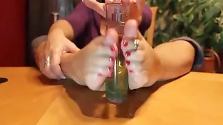 Mature footjob on bottle