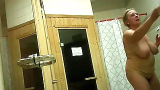 With a 59-year-old mature mother in the sauna.