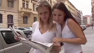 Two girls, two guys have fun together on the bed