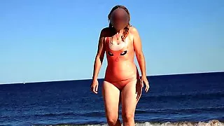 Swimsuit goes transparent when wet revealing her hairy pussy