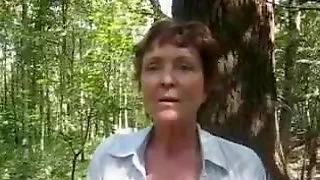 Lady stripping in nature